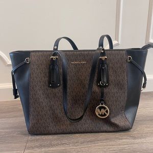 Michael Kors brown and black logo bag
